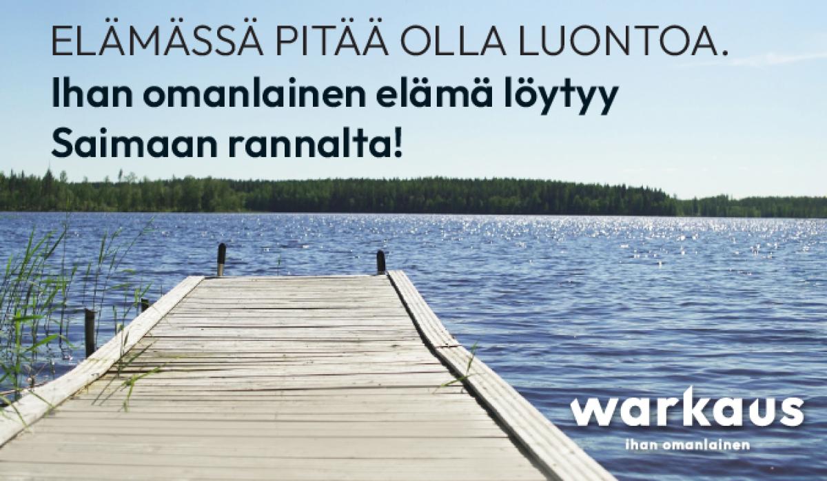 Järvi, laituri ja kesäinen järvimaisema.